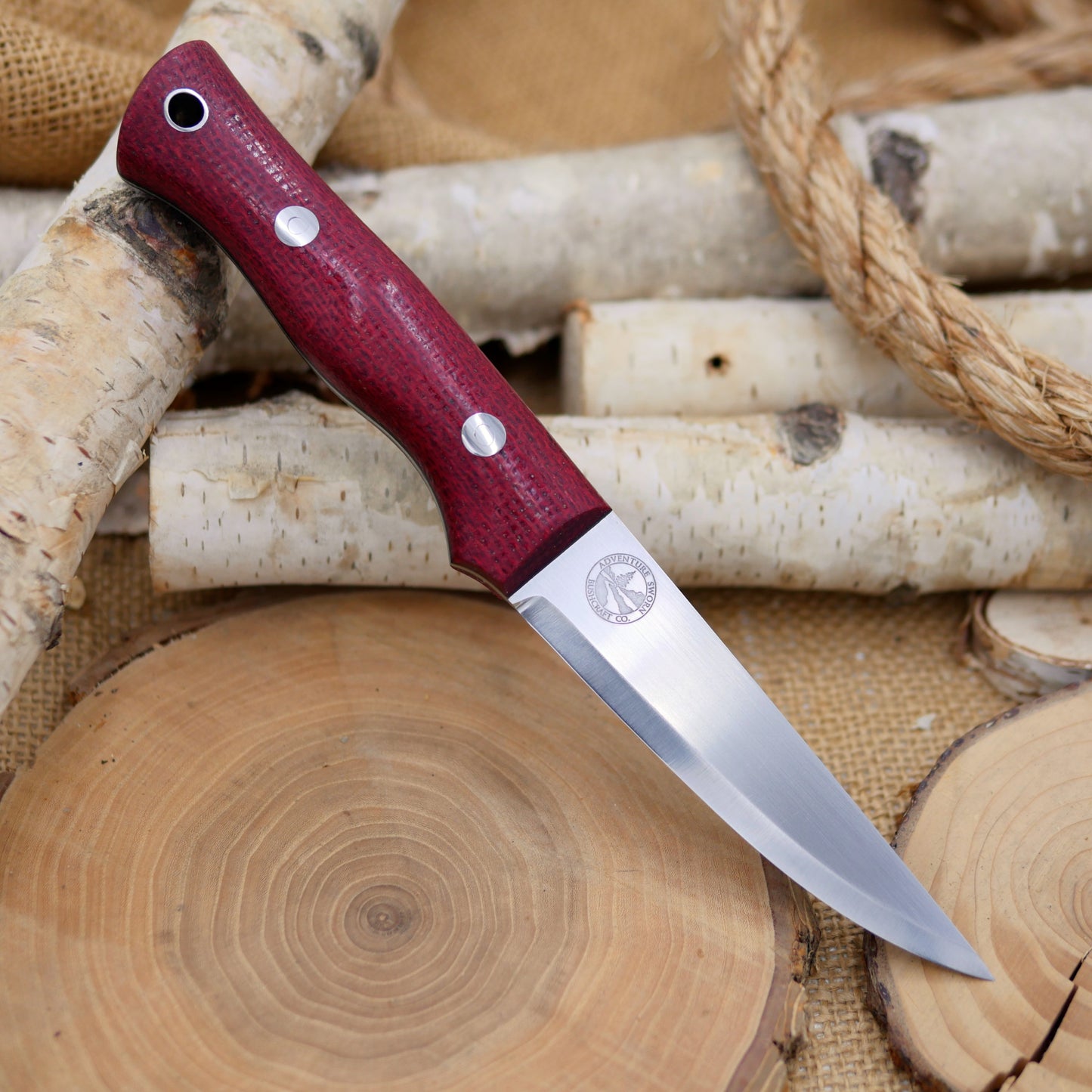 Used Voyageur: CPM 154, Ruby Red Burlap Micarta