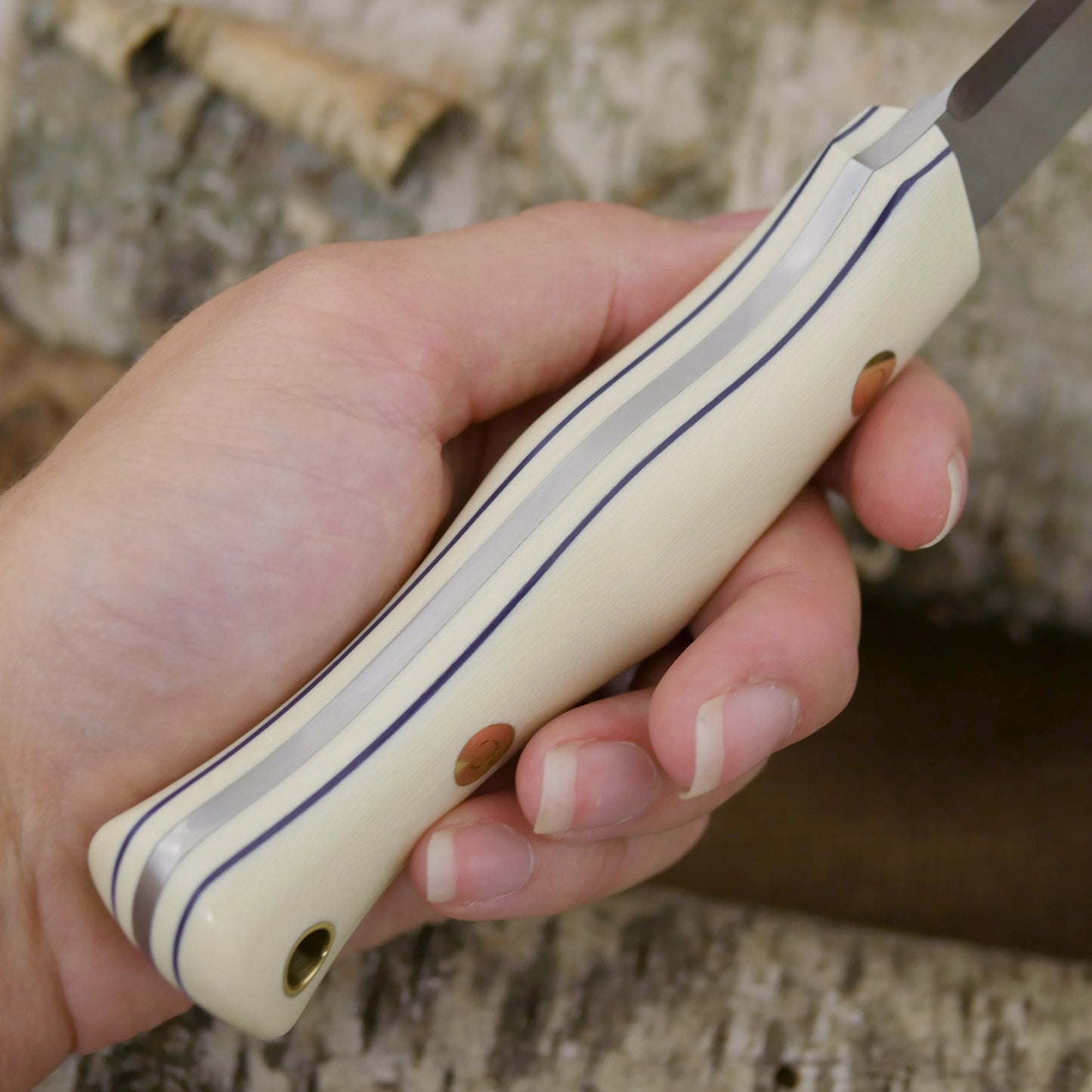 Mountaineer: Ivory G10 & Floating Purple G10