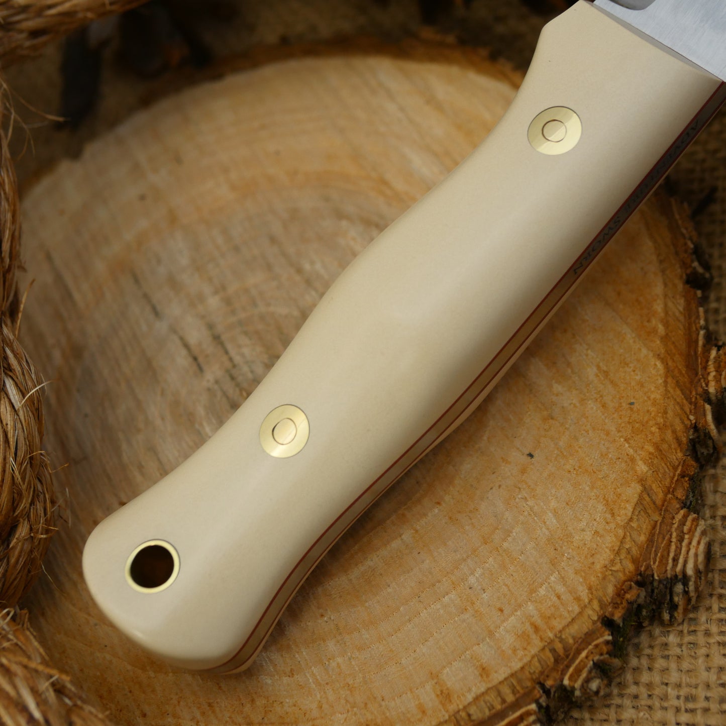 An Adventure Sworn Mountaineer with ivory paper handle scales and cinnamon red liners