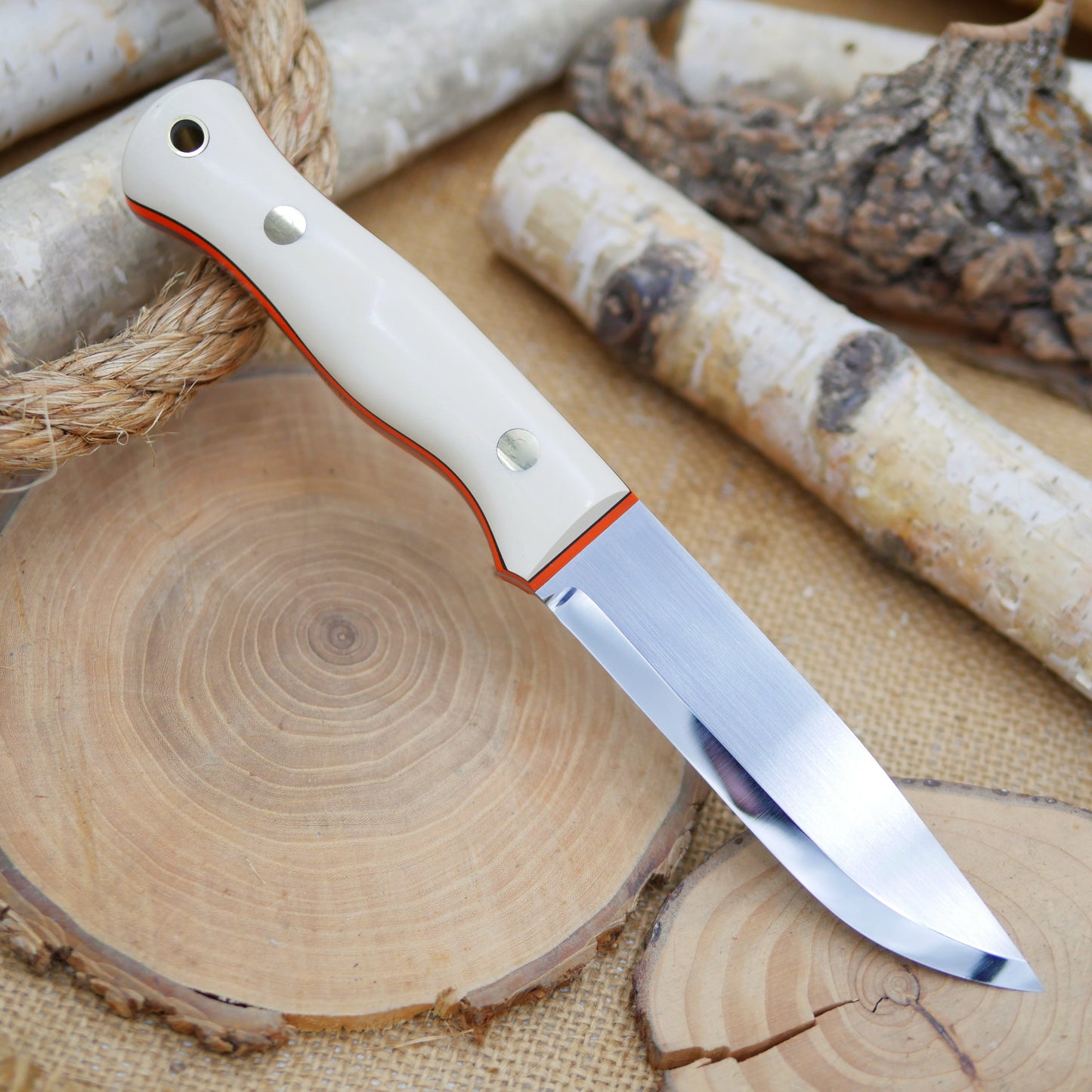 Explorer: Ivory Paper Micarta , Orange & Black Liners