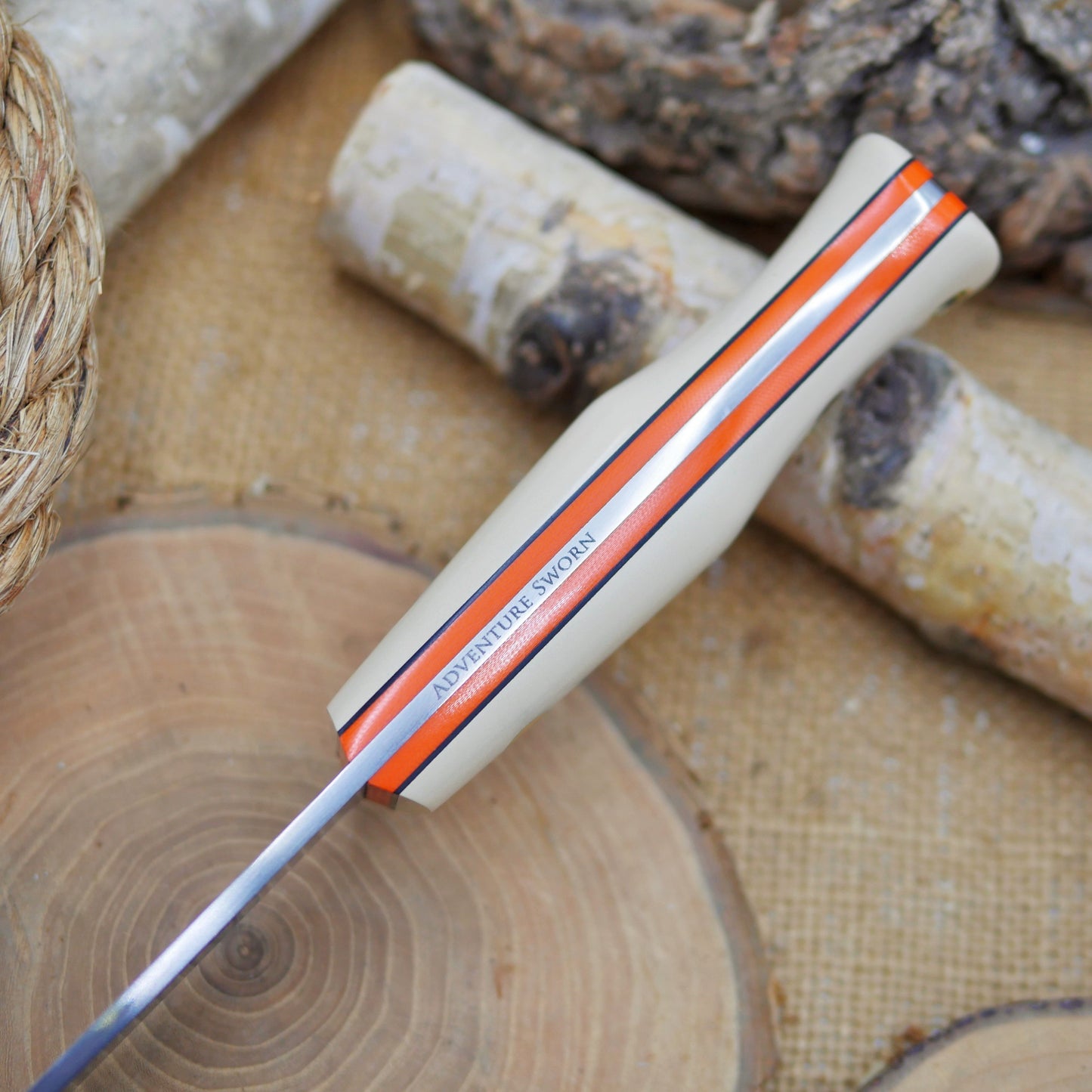 Explorer: Ivory Paper Micarta , Orange & Black Liners