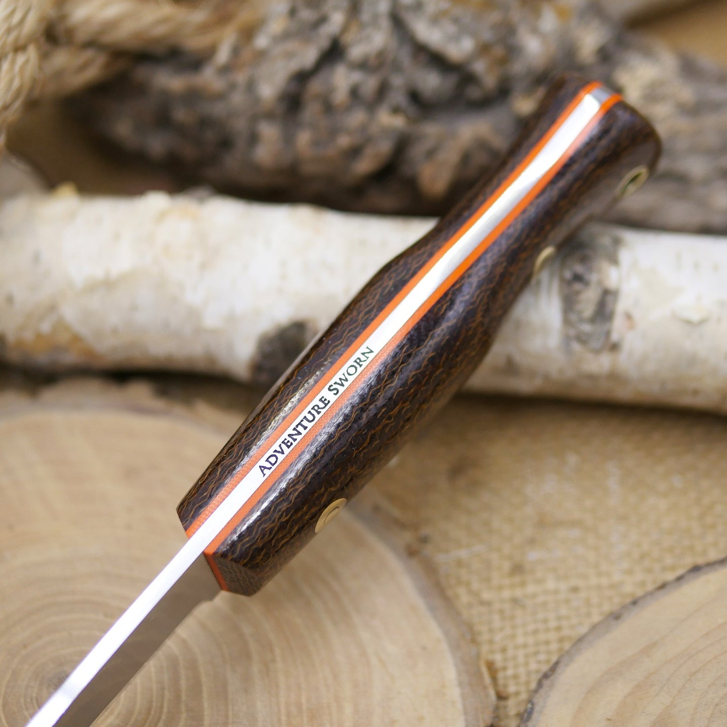 Mountaineer: Dark Brown Burlap Micarta, Orange G10 Liners