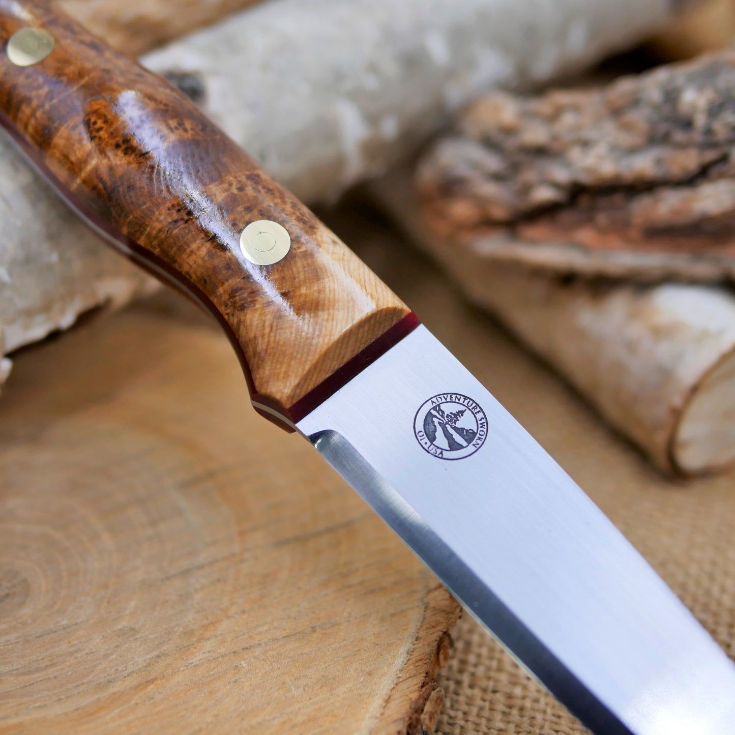 Mountaineer: Black Ash Burl & Red G10