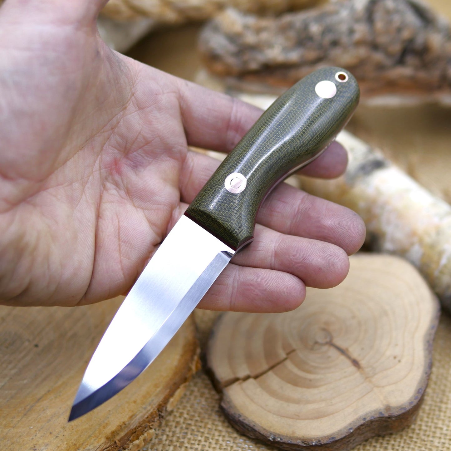 Walker: Green Canvas Micarta, Red Liners, Copper