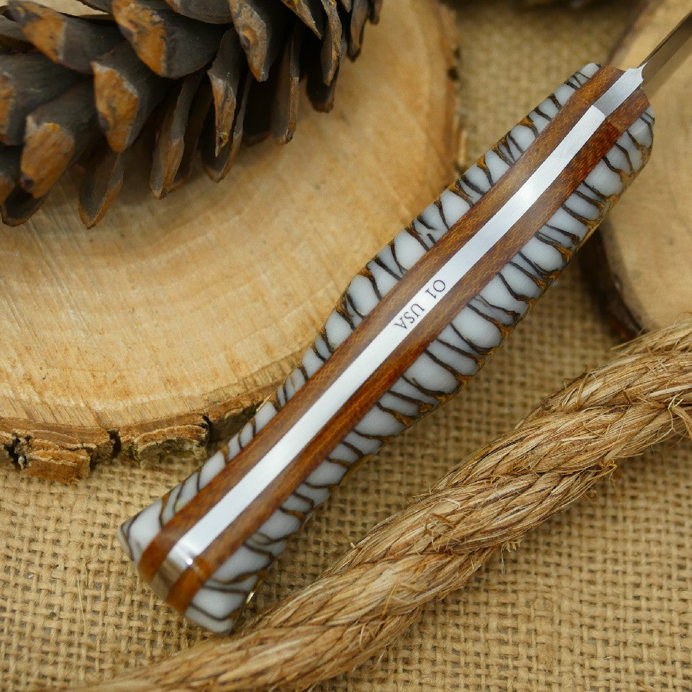 Mountaineer: White Cast Pine Cone & Brown Canvas