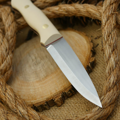 An Adventure Sworn Mountaineer with ivory paper handle scales and cinnamon red liners