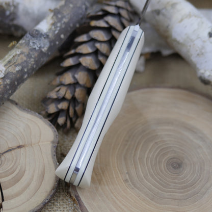 Mountaineer: Ivory Paper, Ivory G10 and Black Liners