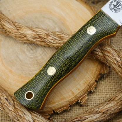 A Voyageur bushcraft knife with evergreen burlap handle scales and double liners