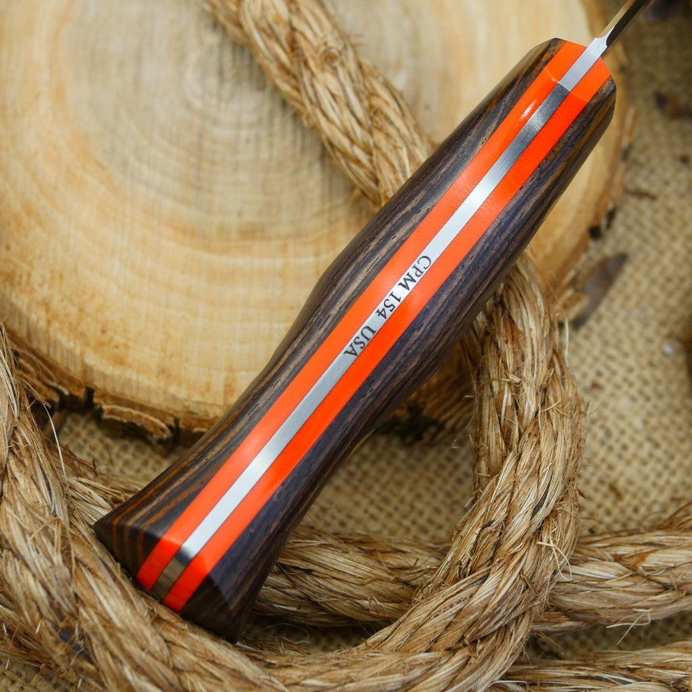A Voyageur bushcraft knife with cocobolo handle scales and hunter orange g10 liners