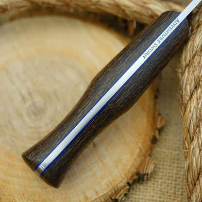An Adventure Sworn Mountaineer with coffee bag burlap handle scales and thin blue liners